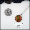 Sterling silver bezel set pendant with deep red Iona bloodstone with green veining throughout the stone. 24mm wide and long