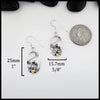 Silver pumpkin frame earrings with measurements and a quarter for scale on a white background ( 25mm or 1" Tall and 15.7mm or 5/8" wide)