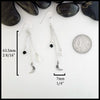 Sterling Silver crescent moon chained drop earrings with onyx and howlite beads. Measuring at 7mmx63.5mm