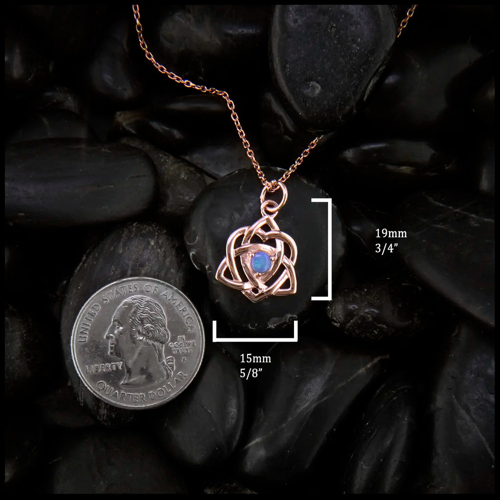 Rose gold Trinity Knot Heart pendant set with 4mm Opal.
Measures at 19mm x 15mm