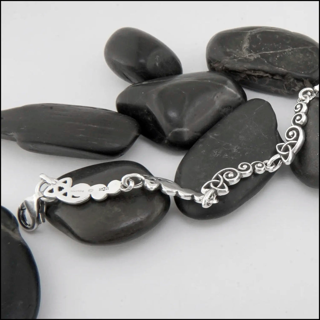 Spiral Trinity Scroll Link Bracelet, stamped with a maker's mark and Sterling Silver 