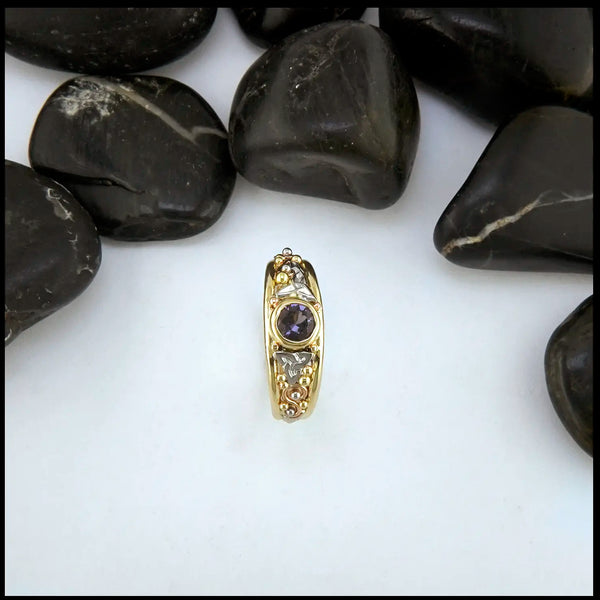 Purple Spinel Gemstone in gold Celtic ring