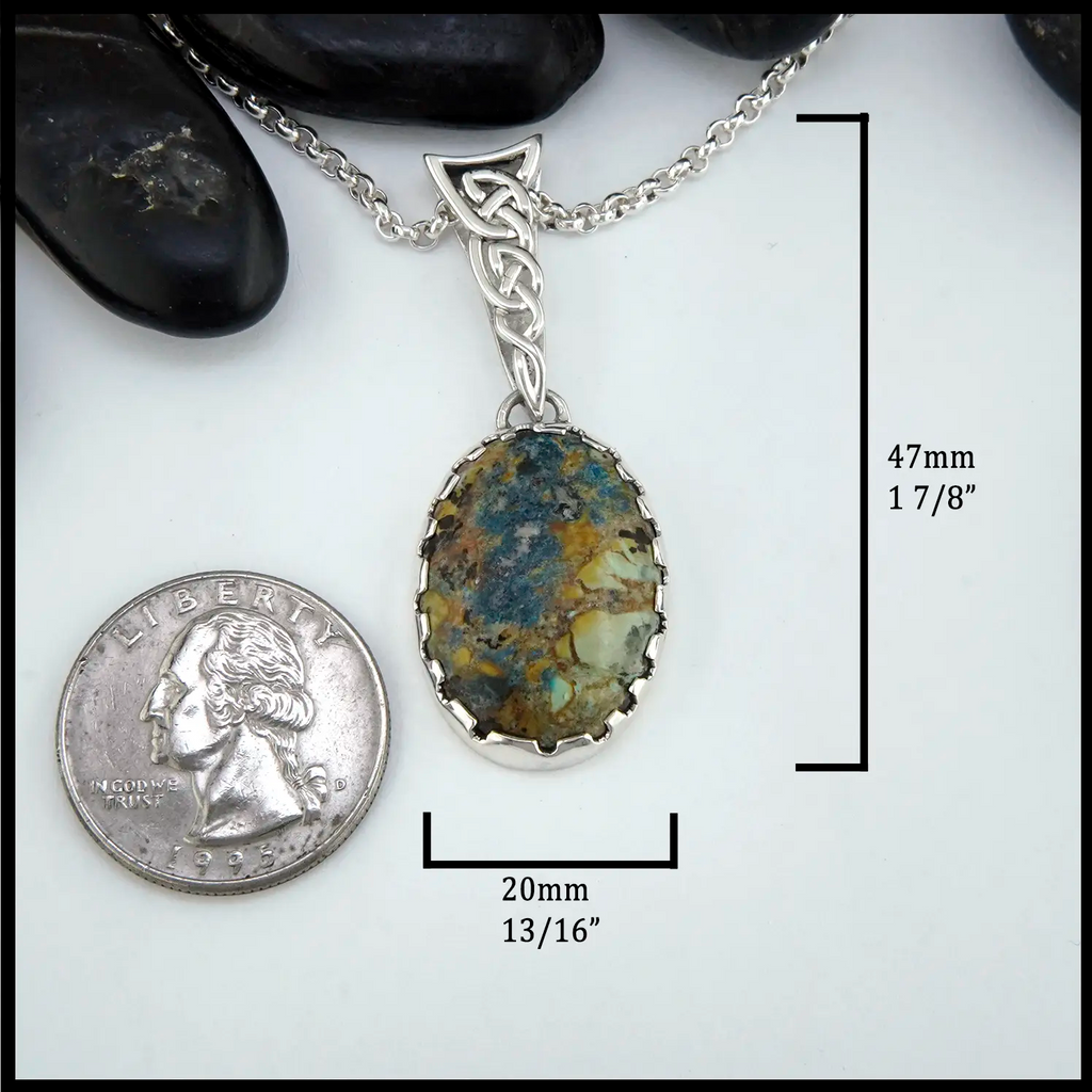 Jasper pendant with silver chain on a white background, compared to a quarter for scale. 47mm by 20mm