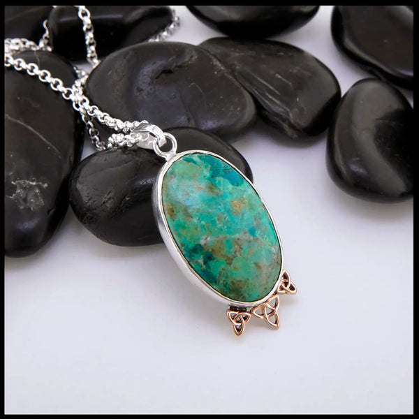 Chrysocolla Pendant set in sterling silver with gold accents