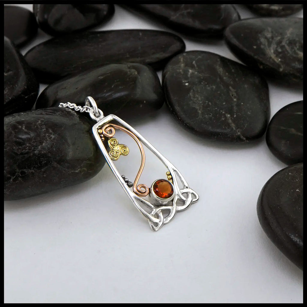 Silver Celtic Pendant with Citrine and yellow and rose gold details
