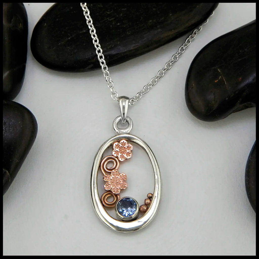 Tanzanite Snowflake Pendant Set in Sterling Silver and 14K Rose Gold