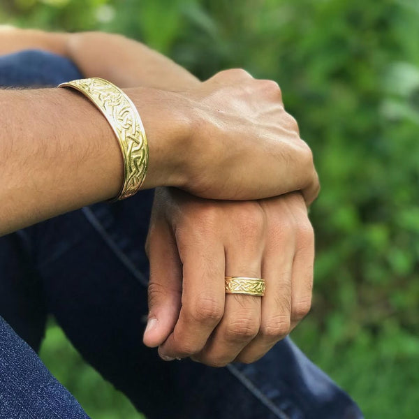 Lorn Knot Ring in Gold shown worn with matching cuff