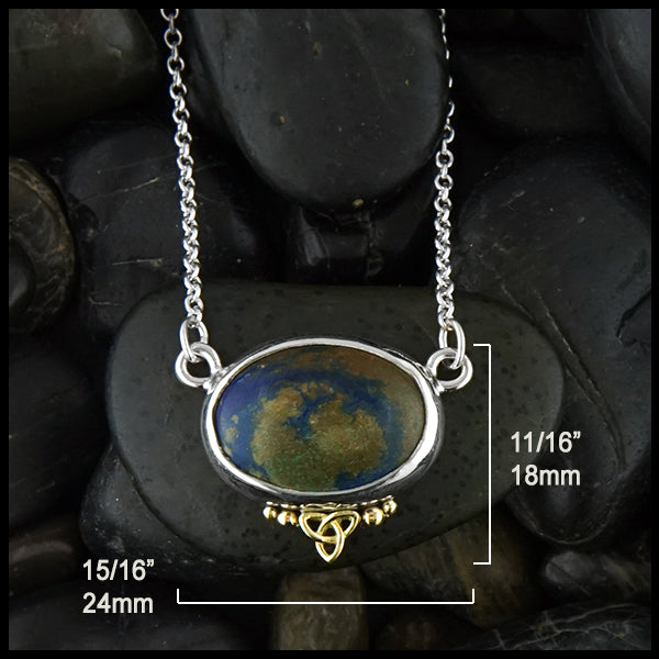 Pendant measures 11/16" by 15/16"