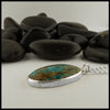 profile view of azurite pendant