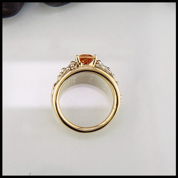 Profile view of Imperial Topaz custom frame ring in 14K Yellow and White gold