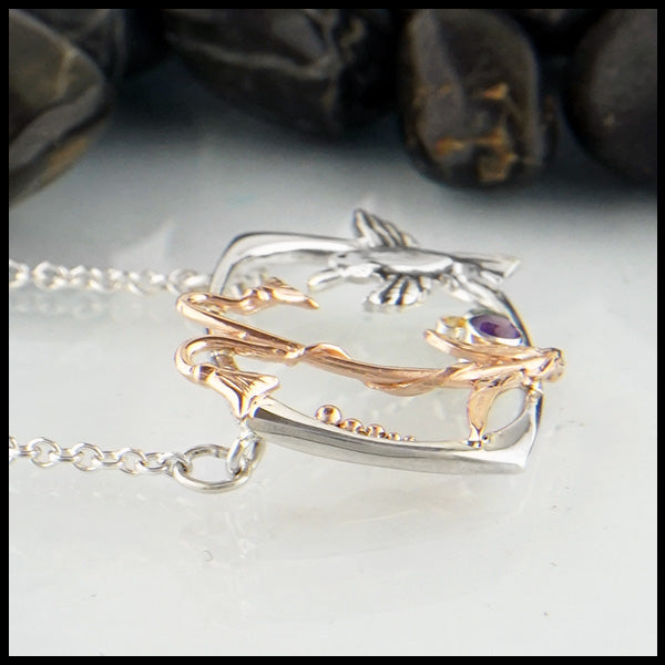 Hummingbird and flower pendant in sterling silver and 14K Rose gold with Amethyst, Tsavorite, and yellow sapphire