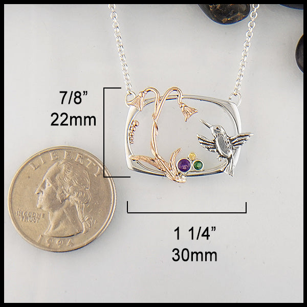 Hummingbird and flower pendant in sterling silver and 14K Rose gold with Amethyst, Tsavorite, and yellow sapphire measures 7/8" by 11/4"