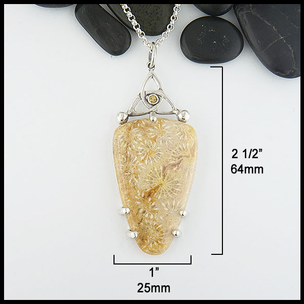 Trinity Coral Pendant measures 2 1/2" by 1".
