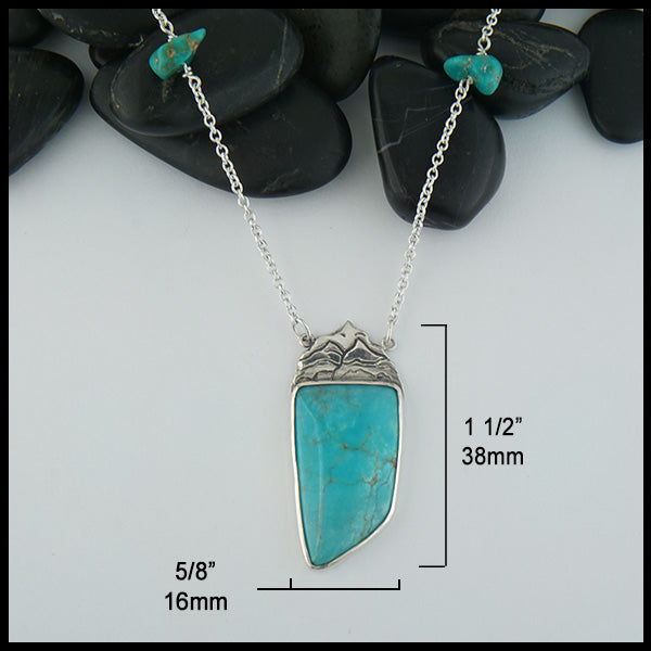 Mountain Turquoise Pendant measures 1 1/2" by 5/8".