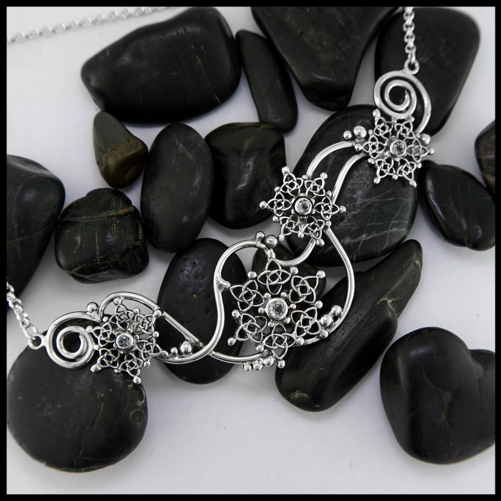 blue topaz snowflake pendant 