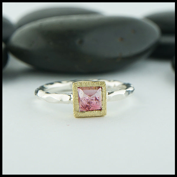 Custom, rustic, hand fabricated ring in sterling silver with a textured 18K yellow gold bezel, set with a Rose Cut Pink Tourmaline.