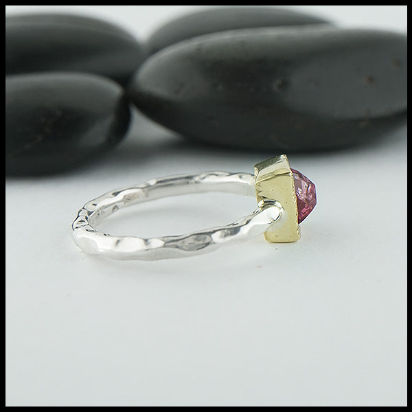 Profile view of custom ring in sterling silver with a textured 18K yellow gold bezel, set with a Rose Cut Pink Tourmaline.