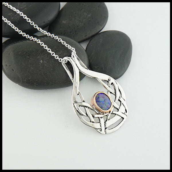 Art Nouveau Pendant in sterling silver with a black opal doublet set in a 14K rose gold bezel.