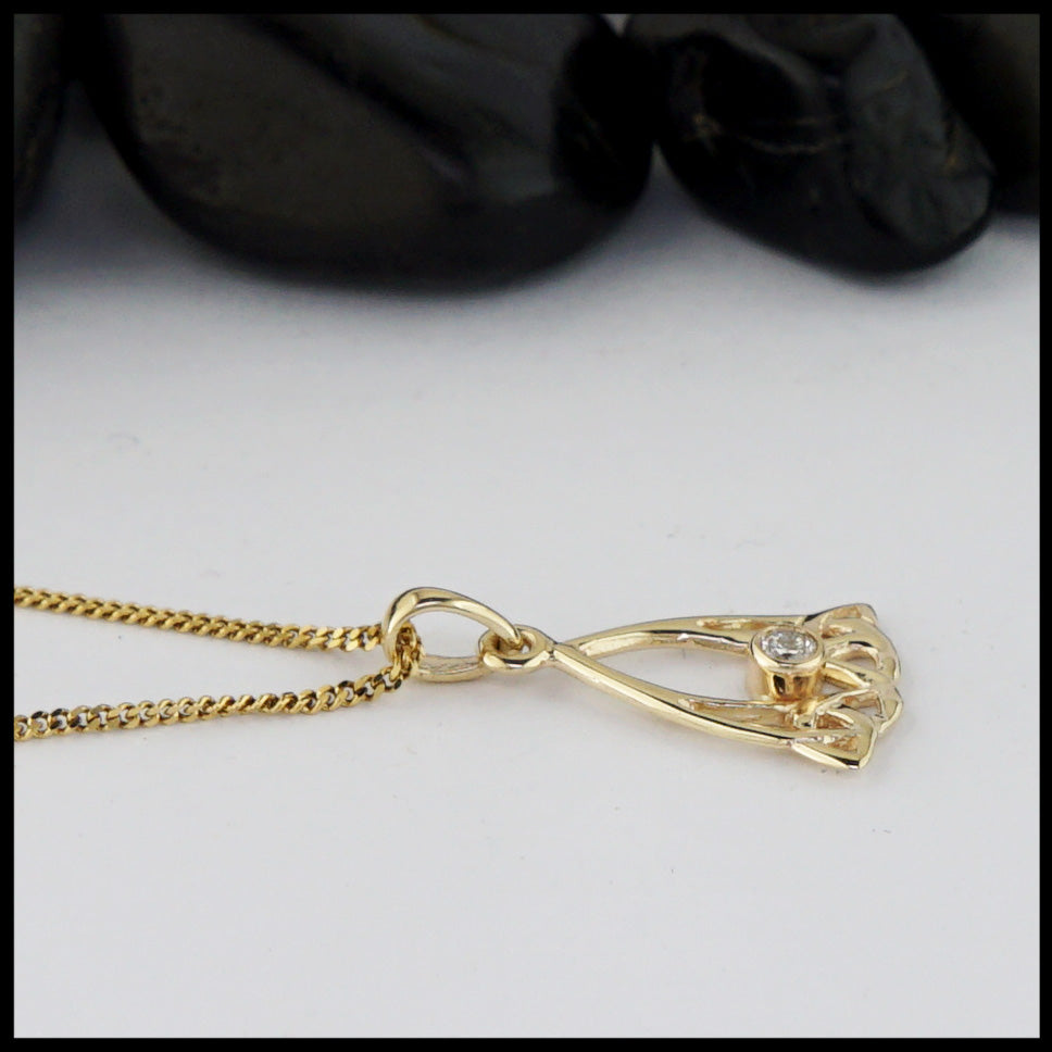 Gold Trinity Knot Pendant and Earring Set with Diamond
