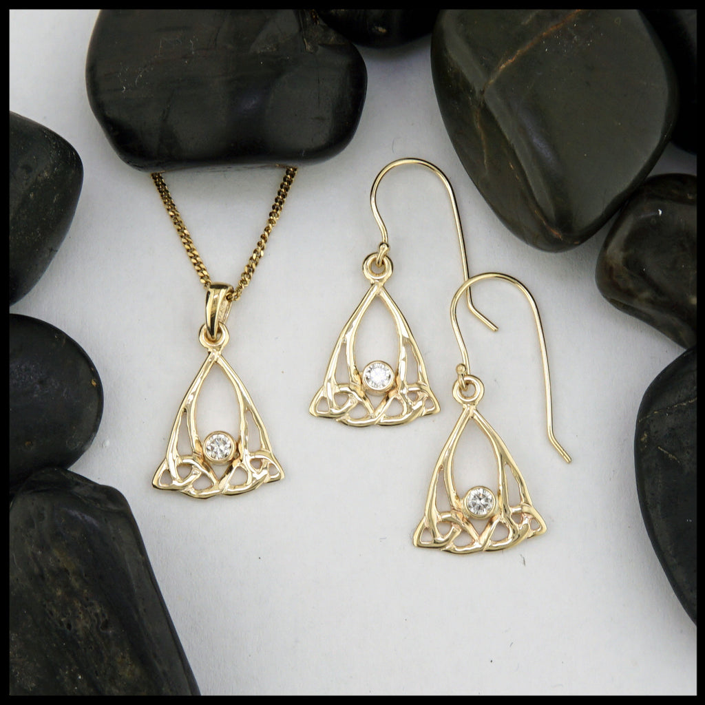 gold pendant and earring set