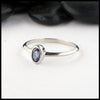 Simple 14K White Gold ring bezel set with a 0.36ct Oval Ceylon Blue Sapphire. 