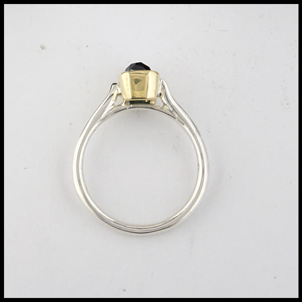 Profile view of rustic hand fabricated ring in sterling silver with an 18K yellow gold bezel set with a Rose Cut Blue Green Tourmaline.
