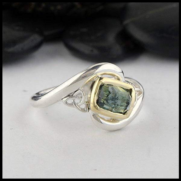 Rustic hand fabricated ring in sterling silver with an 18K yellow gold bezel, set with a Rose Cut  Green Tourmaline with trinity knot accents.