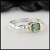 Rustic hand fabricated ring in sterling silver with an 18K yellow gold bezel, set with a Rose Cut Mint Green Tourmaline.