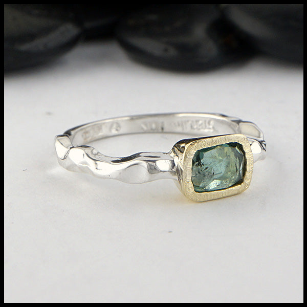 Rustic hand fabricated ring in sterling silver with an 18K yellow gold bezel, set with a Rose Cut Mint Green Tourmaline.