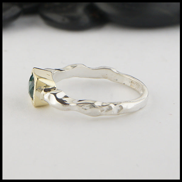 Side view of rustic hand fabricated ring in sterling silver with an 18K yellow gold bezel, set with a Rose Cut Mint Green Tourmaline.