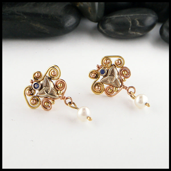 Spiral post earrings in 18K Yellow, 14K Rose & White Gold set with blue sapphires and pearls. 