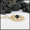 Profile view of a 14K Yellow gold sunflower pendant