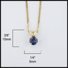 5mm Ceylon Blue Sapphire set in a 14K yellow gold setting with an 18" 14K Yellow Gold light curb chain. Measurements are 1/4" by 3/8".
