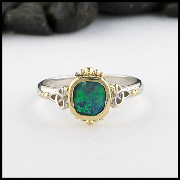 Opal trinity ring with 0.54ct Black Opal and 14K White trinity accents and 18K Yellow Gold. 