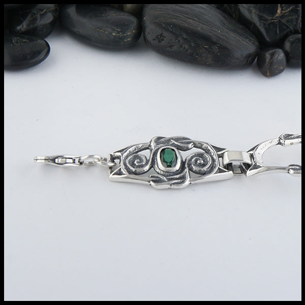 Celtic Spiral Link of bracelet in Sterling Silver set with Green Topaz. 