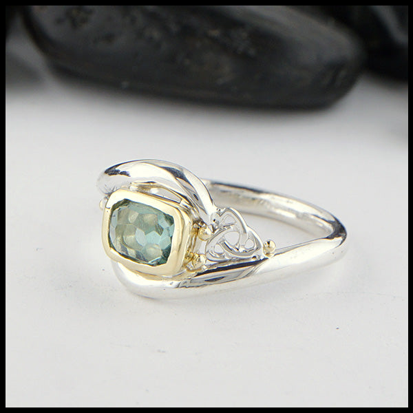 Sterling Silver and 18K yellow gold ring set with a Rose Cut Mint Green Tourmaline with trinity knot accents.