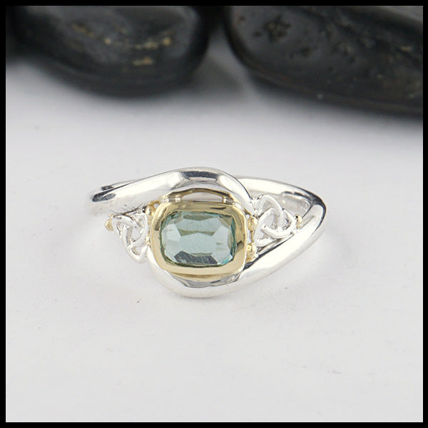 Sterling Silver and 18K yellow gold ring set with a Rose Cut Mint Green Tourmaline with trinity knot accents.