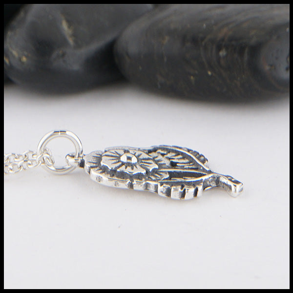 Profile view of English Rose pendant in Sterling Silver.