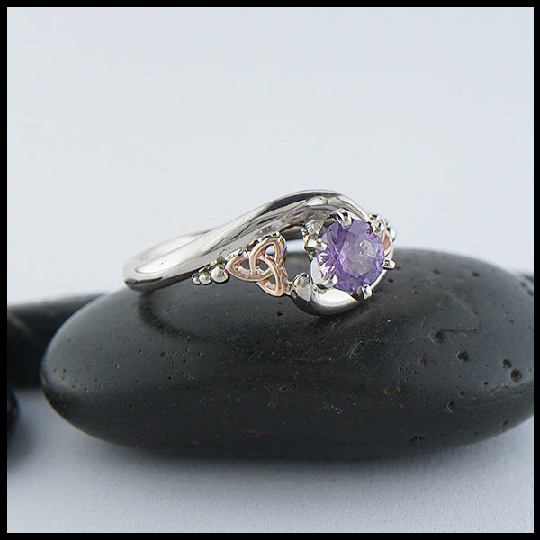 Custom 14K White Gold band with 14K rose gold trinity accents and a stunning purple sapphire. 