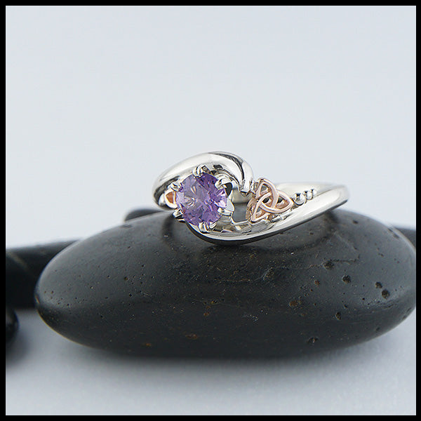 Custom 14K White Gold band with 14K rose gold trinity accents and a stunning purple sapphire. 