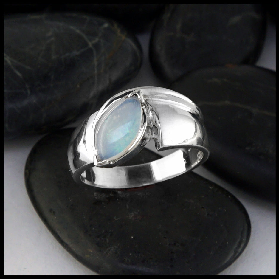 Fashion silver ring with natural white ethiopian opal stone Stock Photo -  Alamy