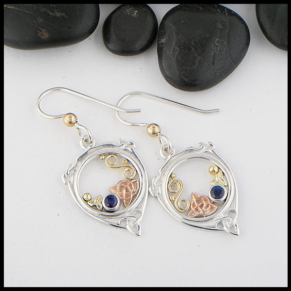 Custom Sterling Silver,14K Rose and 18K yellow gold earrings set with a 3mm Sapphire. 