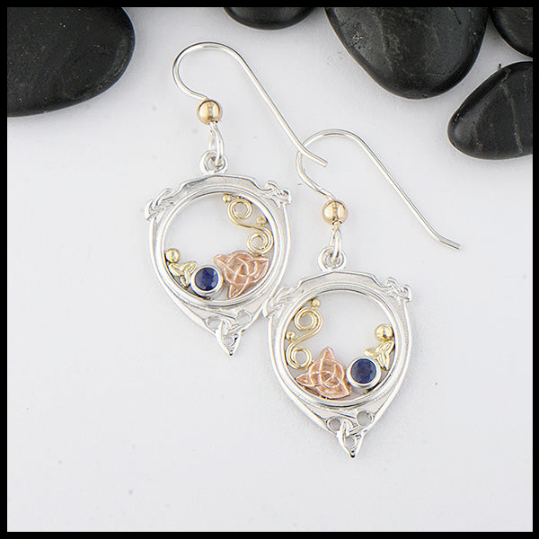 Custom Sterling Silver,14K Rose and 18K yellow gold earrings set with a 3mm Sapphire. 