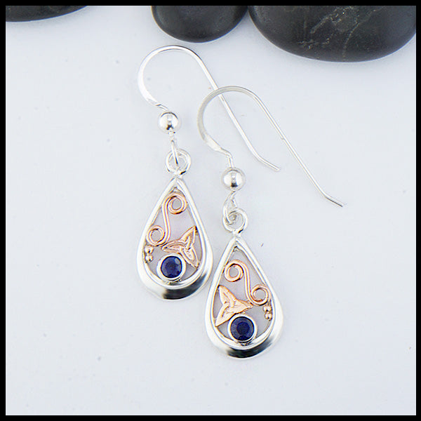 Custom Sterling Silver tear drop earrings with 14K Rose Gold trinity knots and accents, set with a 3mm Sapphire. 