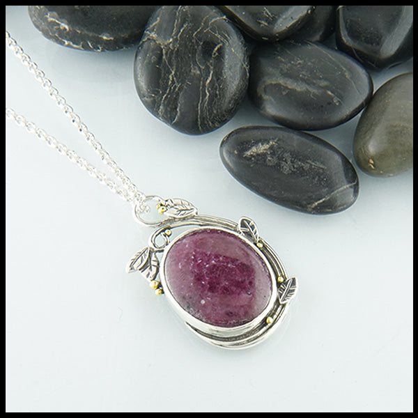 Ruby Cabochon set in Sterling Silver with Gold Accent