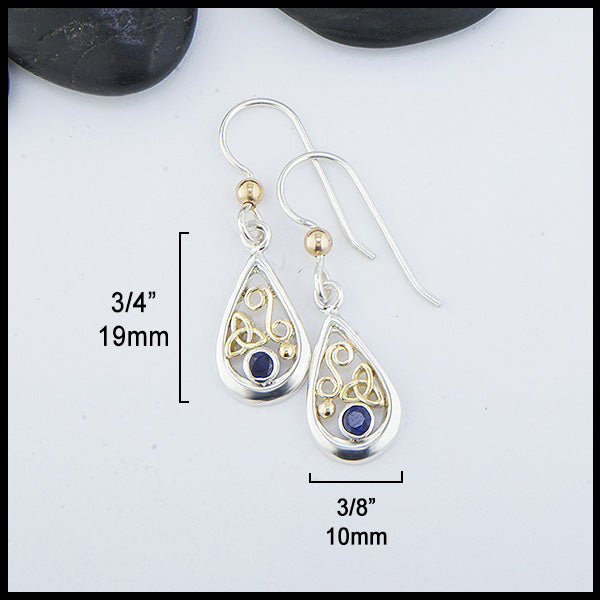 Custom Sterling Silver tear drop earrings with 18K Yellow Gold trinity knots and accents, set with a 3mm Sapphire. 