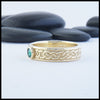 Josephine's Knot band in 14K Yellow gold with Emerald