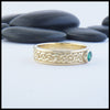 Josephine's Knot band in 14K Yellow gold with Emerald