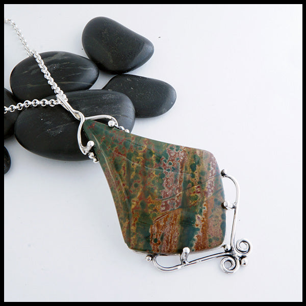 Bloodstone Twist pendant featuring a large Bloodstone cabochon in a hand fabricated sterling silver setting.