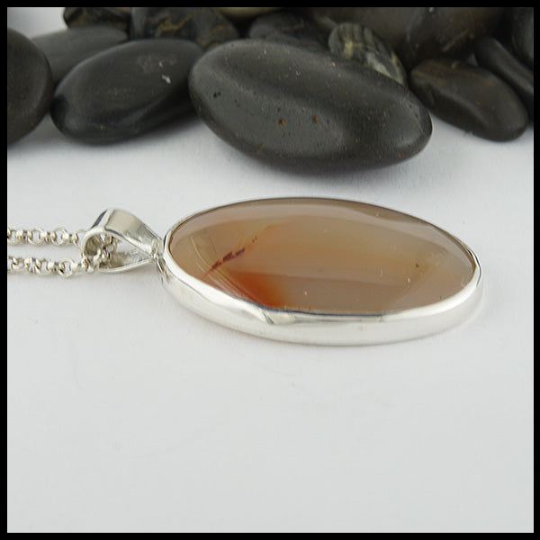 Profile view of Agate Leaf Pendant in Silver